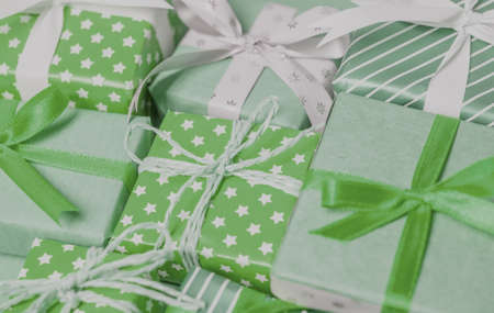 many different green toned presents can be as backgroundの写真素材