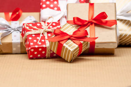 pile of different christmas gifts on craft paper