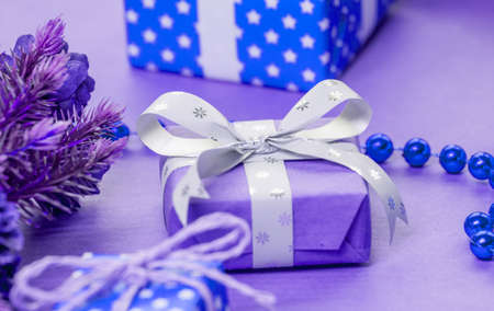 blue christmas presents and decoration preparation different paper and tapesの写真素材