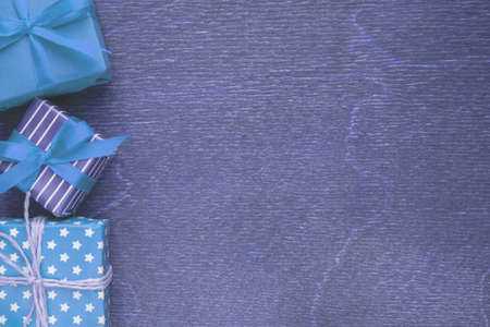 different gifts on wooden backgroundの写真素材