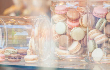 colourful macaroons in glass jarsの写真素材