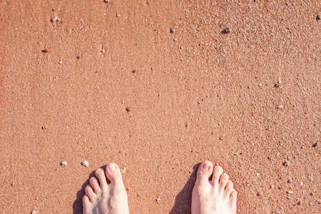 barefoot on sandの写真素材