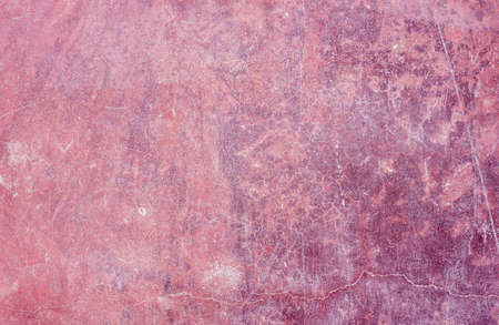 violet painted scratched concrete backgroundの写真素材