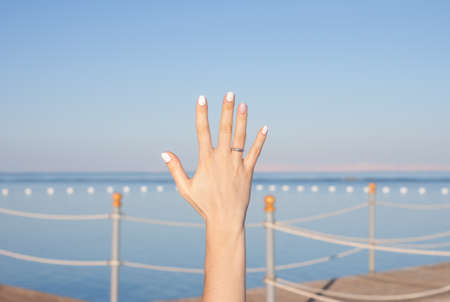 female hand with ringの写真素材