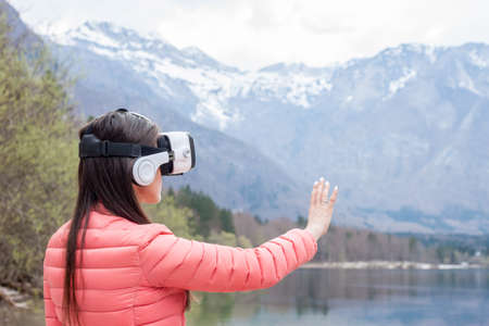 young woman in VR glasses