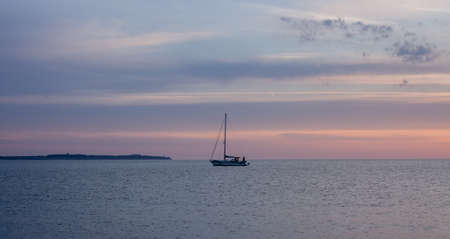 colorful sunset over Adriatic sea with yachtの写真素材