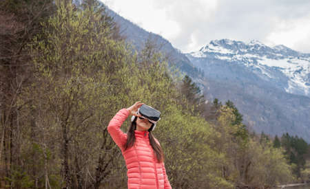 young woman in VR glassesの写真素材