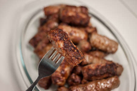 plate with grilled cevapcici balkan cuisineの写真素材