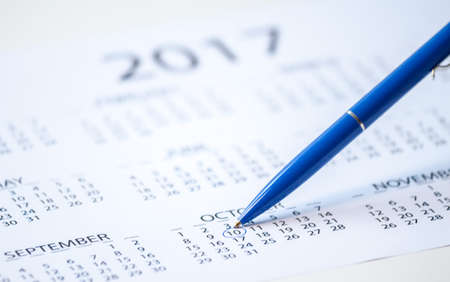 pen marks on the calendar plan for monthの写真素材