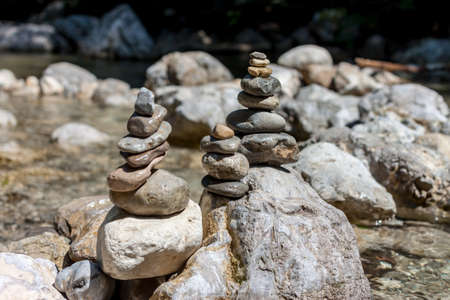 balancing stones on the mountain riverの写真素材