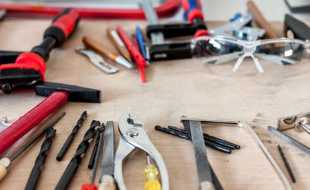 black and white many different tools in mess