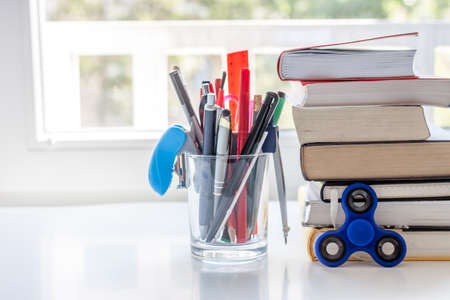work desk with stationery booksの写真素材