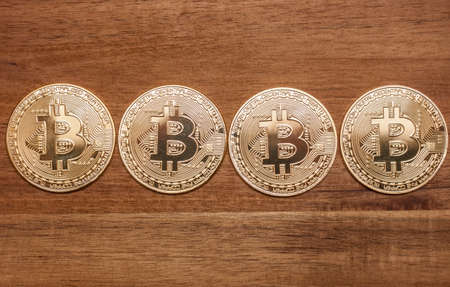 four golden bitcoin coinsの写真素材