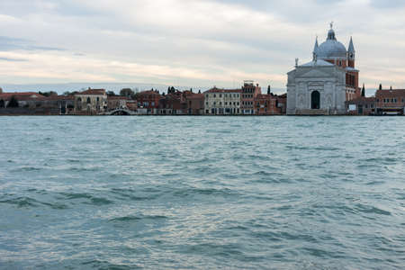Beautiful town of Venice over channel with copyspaceの写真素材