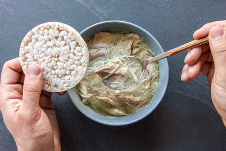 Asian soup with duck man handsの写真素材
