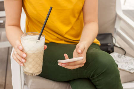 female hands with mobile phone