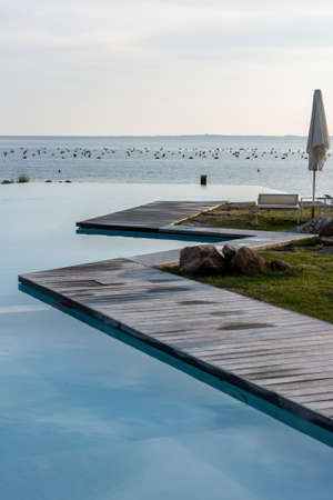 beach club pool over the sea