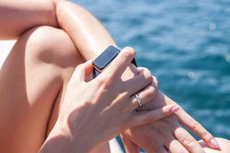 woman using her smart watchの写真素材