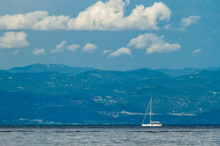 dramatic seascape Adriatic sea and lonely boatの写真素材