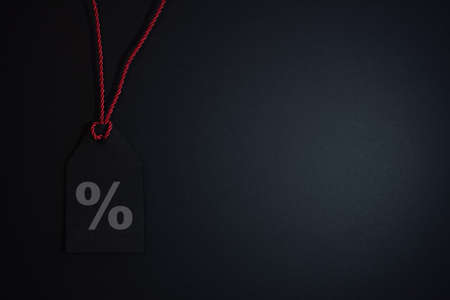 black friday sale tag on dark backgroundの写真素材