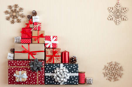 big pile of colorful christmas presents with bow knots. Copy space