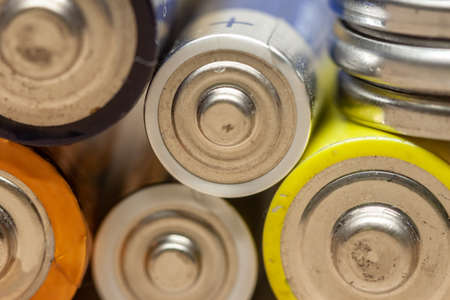 macro many used old alkaline batteries in pile hazardous waste non recyclableの写真素材