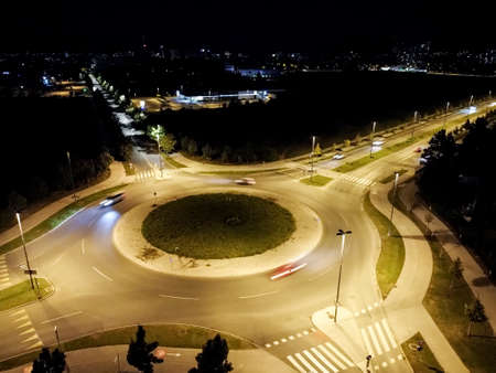 streets roundabout crossing at night drone top view