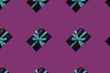 christmas pattern burgundy gift boxes on purple background