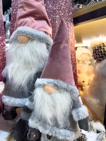 three little christmas gnomes gonks in pink hats mobile photoの写真素材