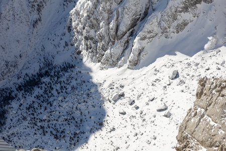 Winter mountain rock background covered with snow