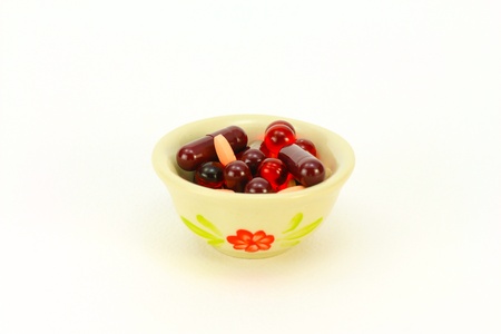 colorful medicine in the bowlの写真素材