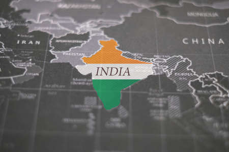 Close up of India map with flag color on world map.の写真素材
