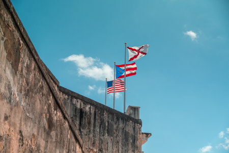 Flags at Castillo San Cristobal (fort, castle) in Old San Juan in Puerto Rico - Caribbean