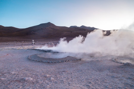 Steaming geysers in Bolivia near Uyuni and Laguna Colorado - Sunsetの写真素材