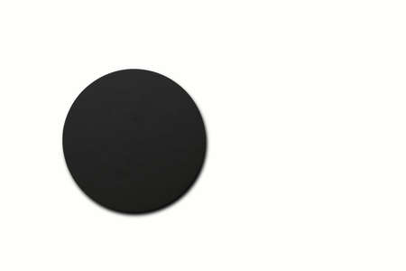 Top up view of black circle coaster on white . fit for your design element.の写真素材
