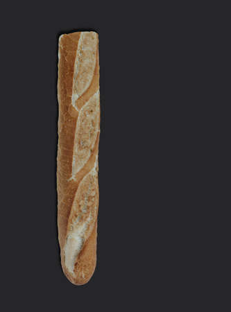 Crunchy french baguette, on black background with copy space for text