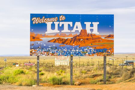 welcome to Utah  sign with mountain background on the day.   for editorial 07/09/16のeditorial素材