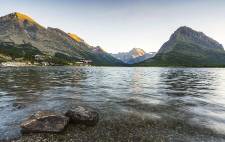 beautiful landscape at Swiftcurrent Lake  when sunrise in Many Glacier area ,Montana's Glacier National Park,Montana,usa.の写真素材
