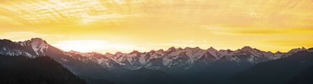 panorama of Mountain peaks landscape at sunset.の写真素材