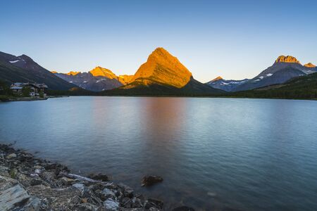 beautiful landscape at Swiftcurrent Lake  when sunrise in Many Glacier area ,Montana's Glacier National Park,Montana,usa.の素材 [FY310146683459]