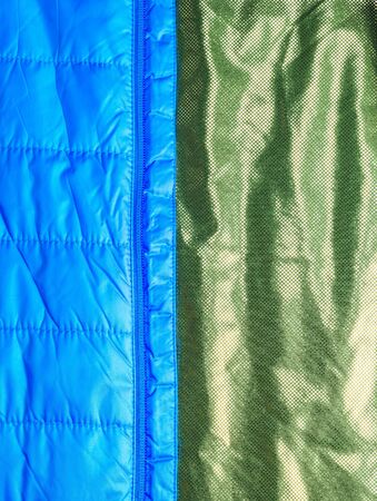 blue warm insulated texture of jacket,warm light weight insulated jacket on white background,Ready for product display montage..の写真素材