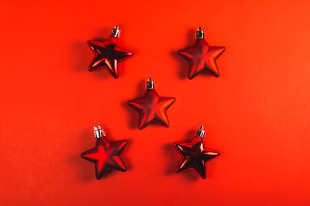 red ornaments on red background..の写真素材