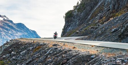 scenic view of curve and slope asphalt road on the mountain on the day in summer season..の写真素材