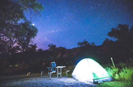 camping in campground area at night with star on the sky in national park campground.の写真素材
