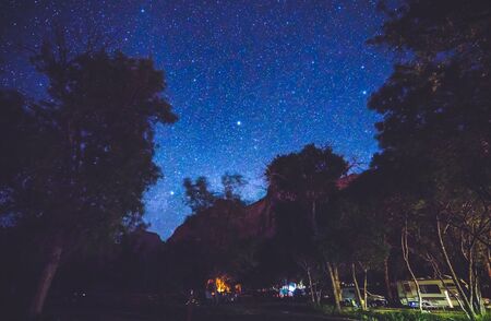 camping in campground area at night with star on the sky in national park campground.の写真素材