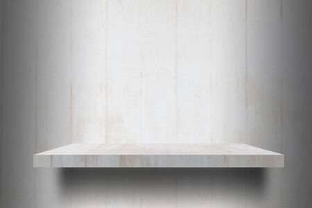 empty  white wooden shelves top Ready for product display montage and wooden background.の写真素材