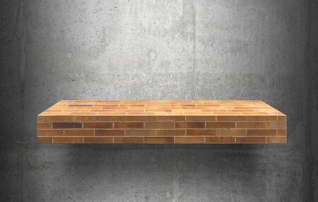 empty brick shelves top Ready for product display montage; cement shelves and gray cement background.の写真素材