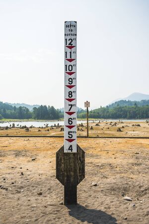water level pole appear  when rainless.の写真素材