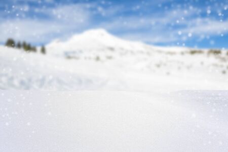 snow floor foreground with snow mountain background,Ready for product display montage.の写真素材