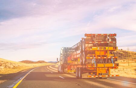 truck  running on the road when sunset in California.